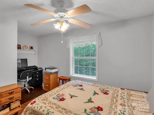 a view of workspace with wooden floor