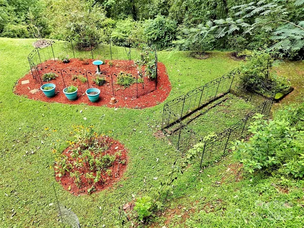 a view of a garden with a fountain