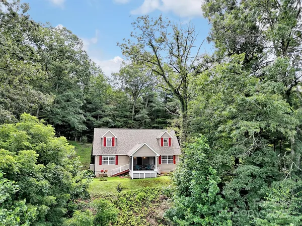 a view of a street with sign board