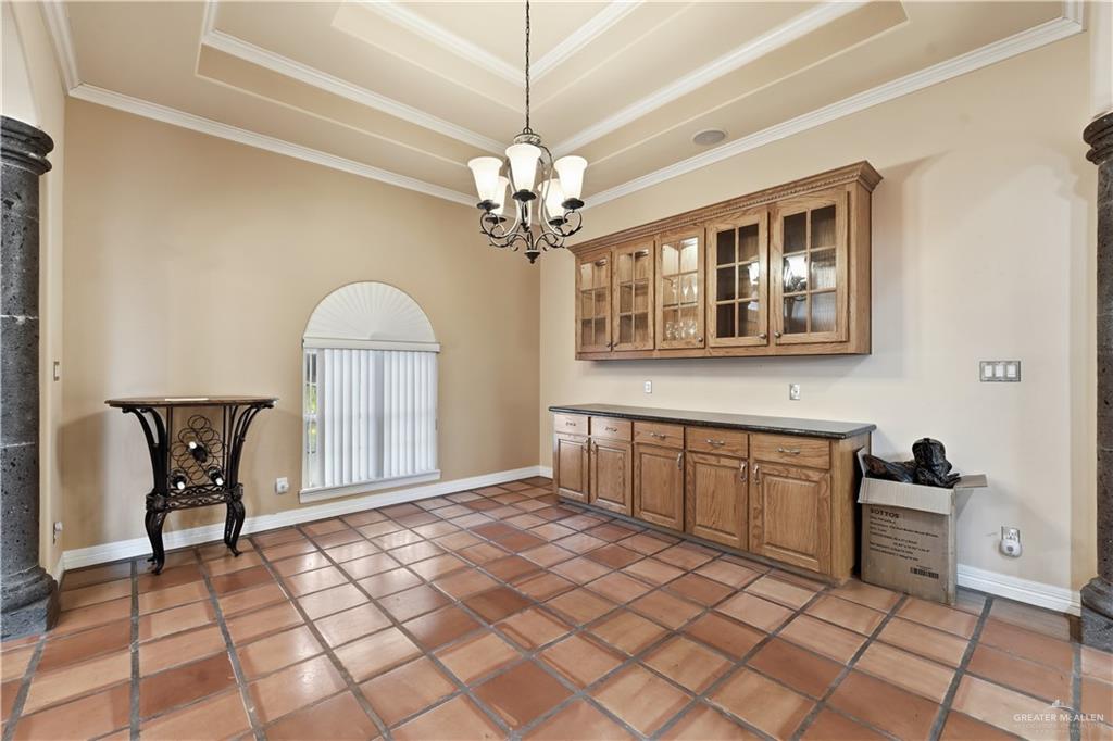 804 Inspiration Drive Pharr, TX 78577 - Photo 15 of 39 a view of a livingroom with a chandelier furniture and windows