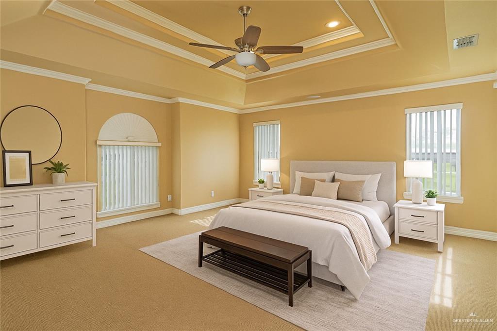 804 Inspiration Drive Pharr, TX 78577 - Photo 18 of 39 a spacious bedroom with a bed a dresser and a window