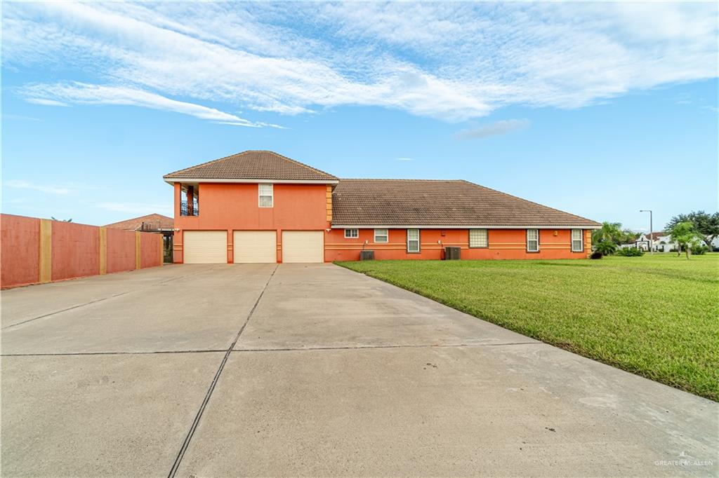 804 Inspiration Drive Pharr, TX 78577 - Photo 3 of 39 a view of a house with a yard and sitting area