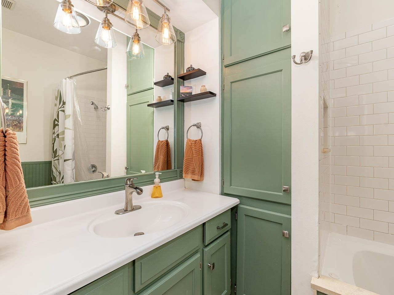 401 West Whitaker Mill Road Raleigh, NC 27608 - Photo 15 of 30 Attractive recently updated full bath with tile shower/bath. Full Bath