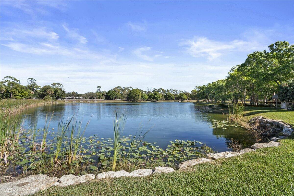10975 Randolph Siding Road Jupiter, FL 33478 - Photo 83 of 97 a view of a lake with a city view