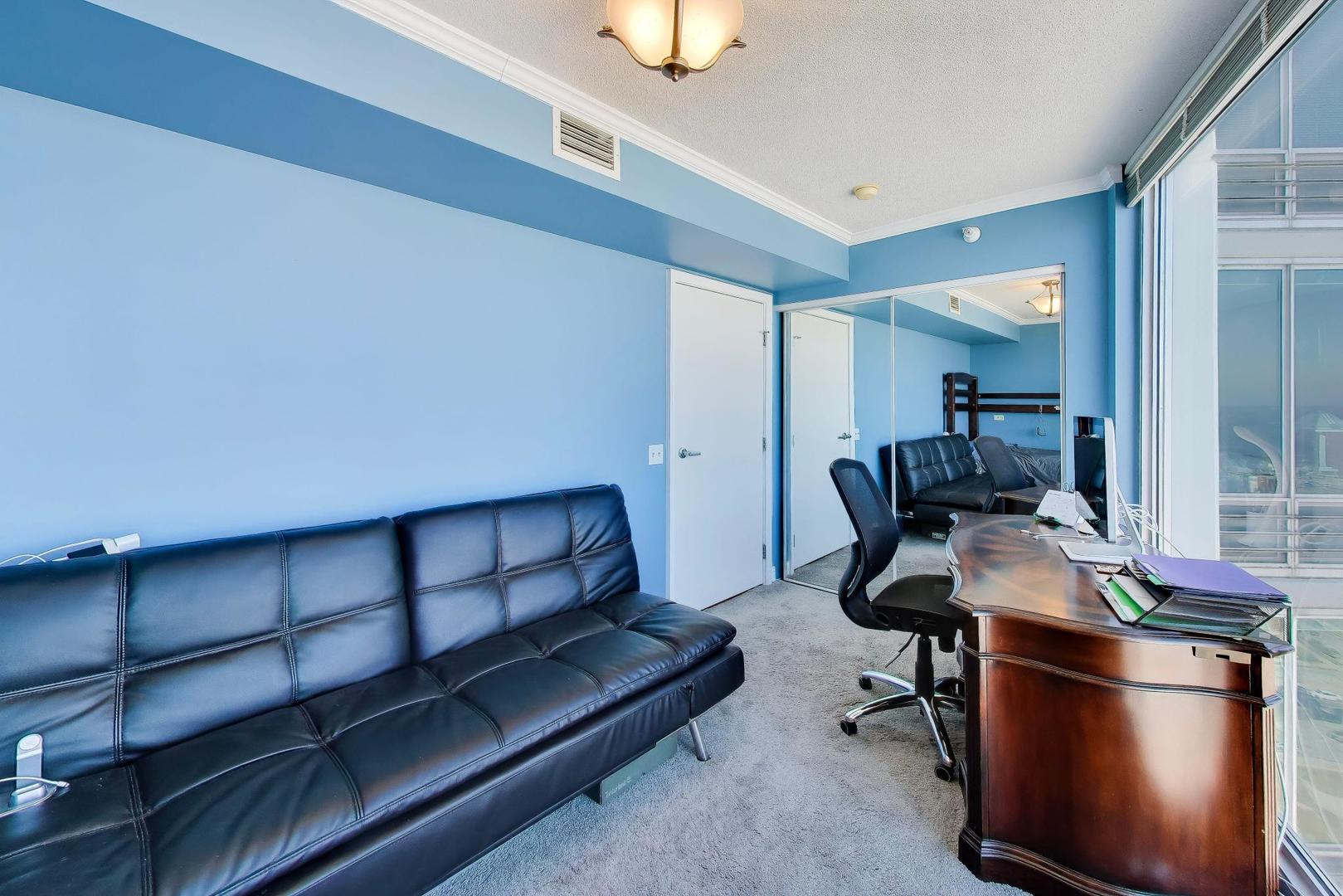 1720 Maple Avenue, Unit 2420 Evanston, IL 60201 - Photo 25 of 76 a workspace with furniture and window