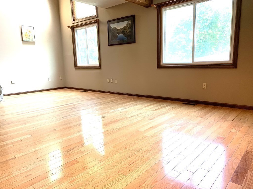 325 Mammoth Road, Unit 7 Lowell, MA 01854 - Photo 9 of 33 a view of an empty room with a window