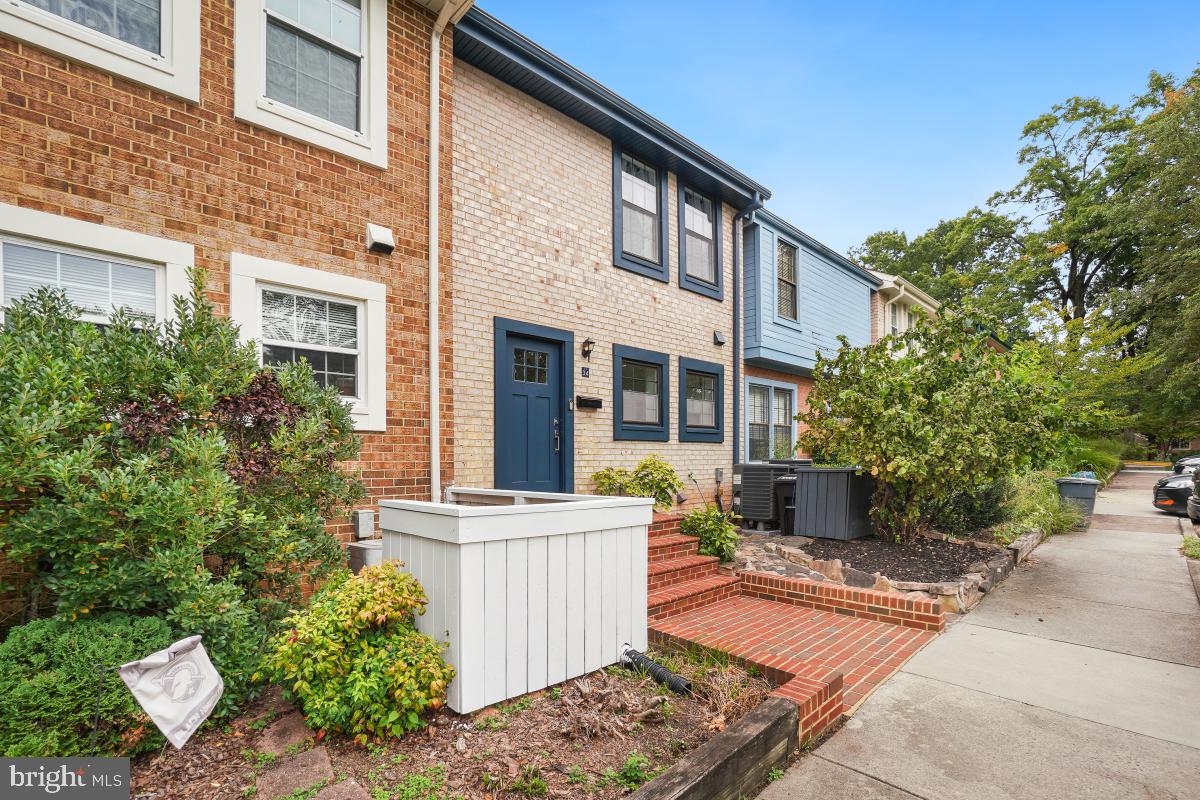 2134 Golf Course Drive Reston, VA 20191 - Photo 2 of 55 a view of a house with a yard and sitting area