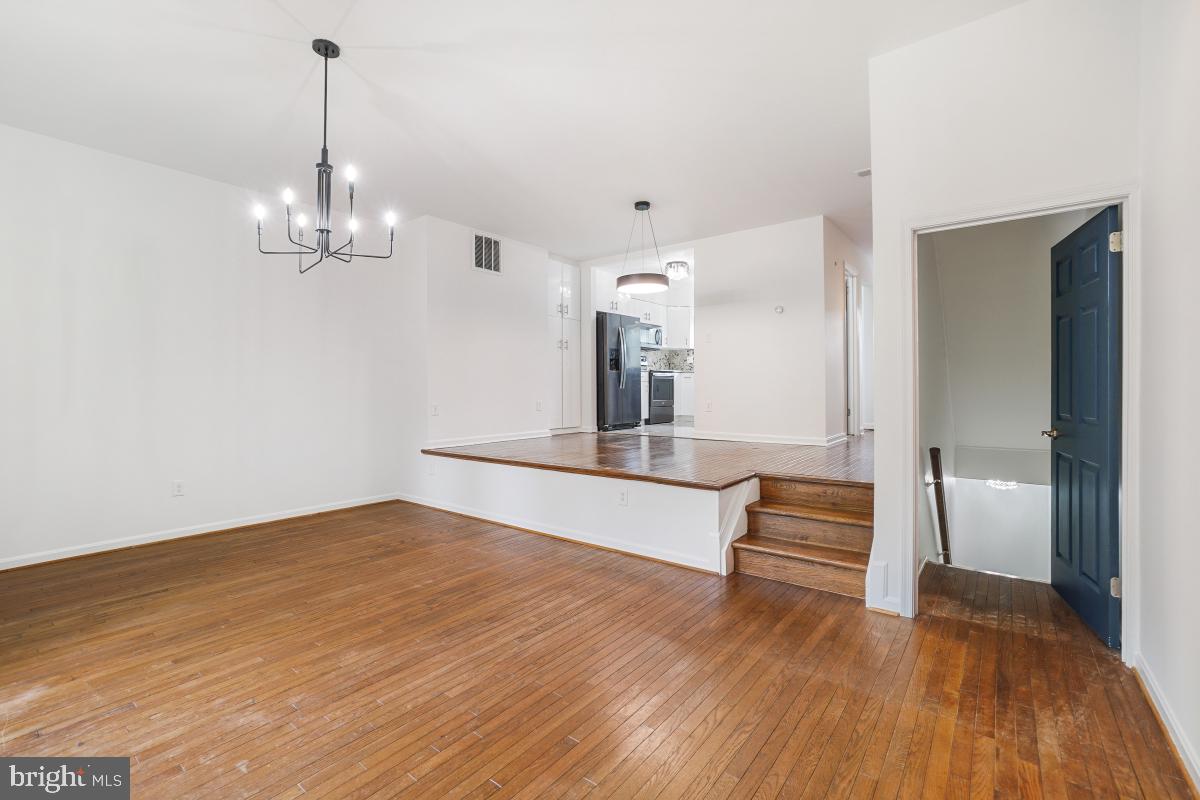 2134 Golf Course Drive Reston, VA 20191 - Photo 21 of 55 a view of empty room with wooden floor