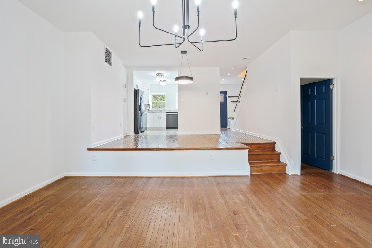 2134 Golf Course Drive Reston, VA 20191 - Photo 24 of 55 a view of entryway and hall with wooden floor