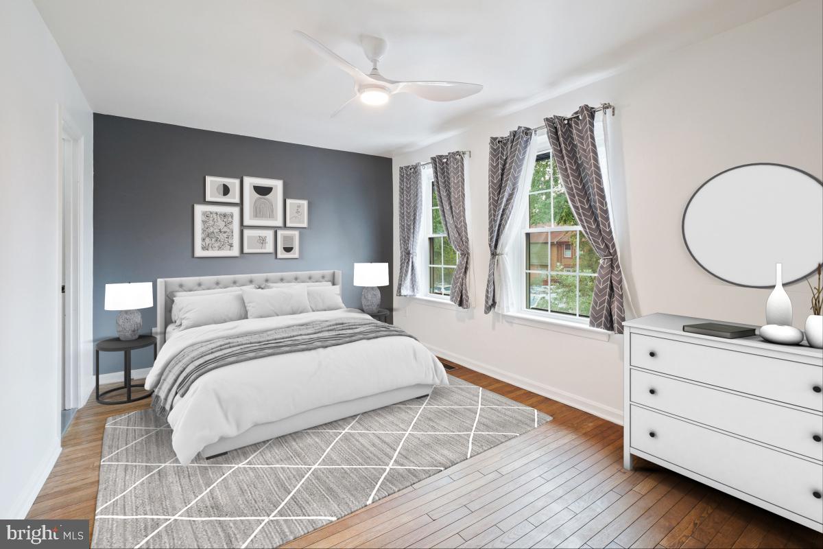 2134 Golf Course Drive Reston, VA 20191 - Photo 26 of 55 a bedroom with a large bed and a window