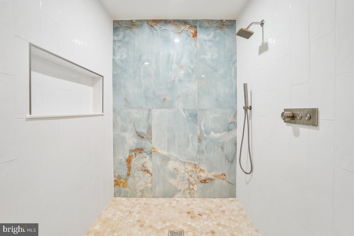 2134 Golf Course Drive Reston, VA 20191 - Photo 36 of 55 a bathroom with a shower