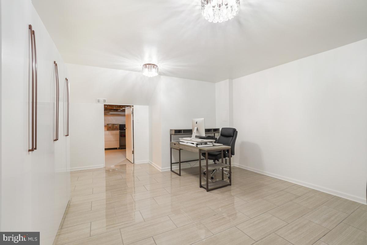 2134 Golf Course Drive Reston, VA 20191 - Photo 41 of 55 a view of kitchen with furniture and a chandelier