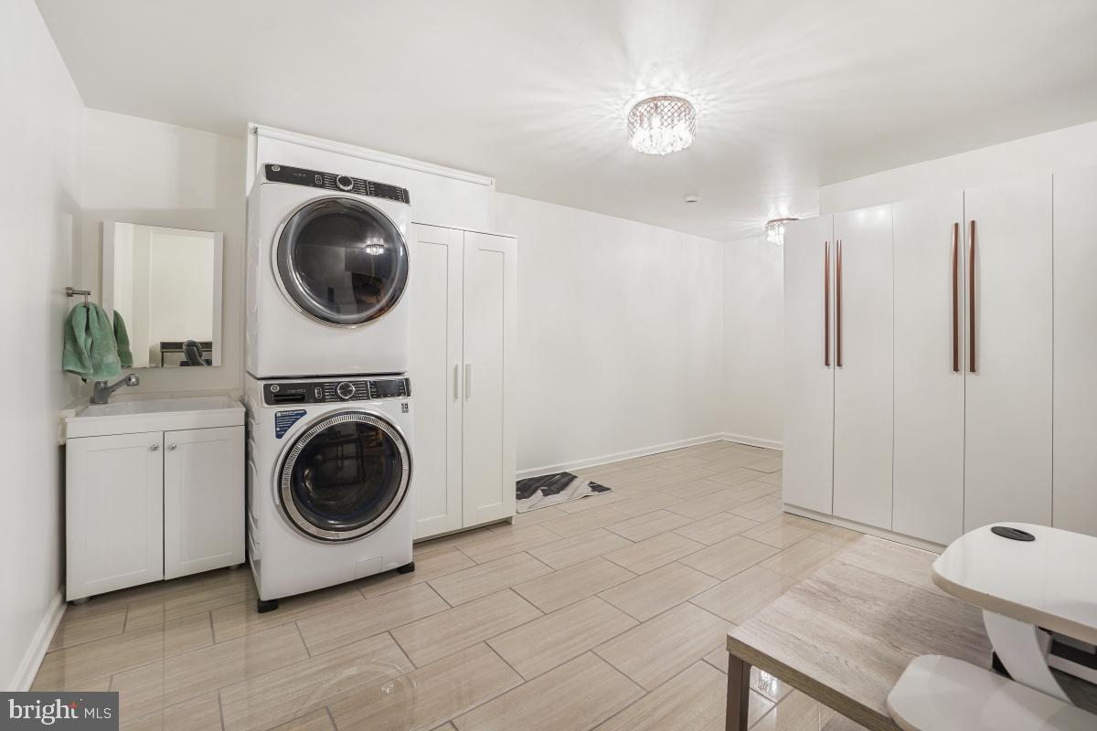 2134 Golf Course Drive Reston, VA 20191 - Photo 43 of 55 a view of a hallway with washer and dryer