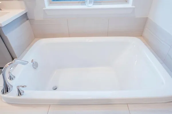 a view of a swimming pool with an ocean view