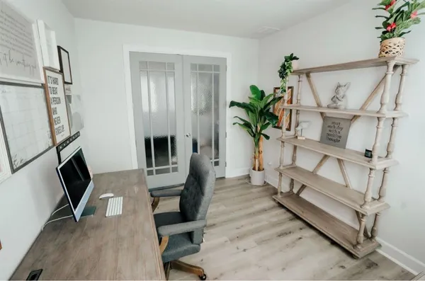 a kitchen with stainless steel appliances a refrigerator sink and microwave