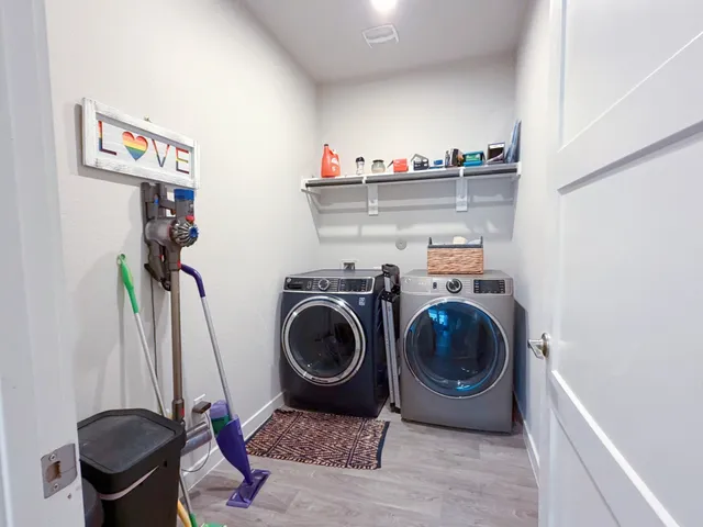 a utility room with dryer and washer