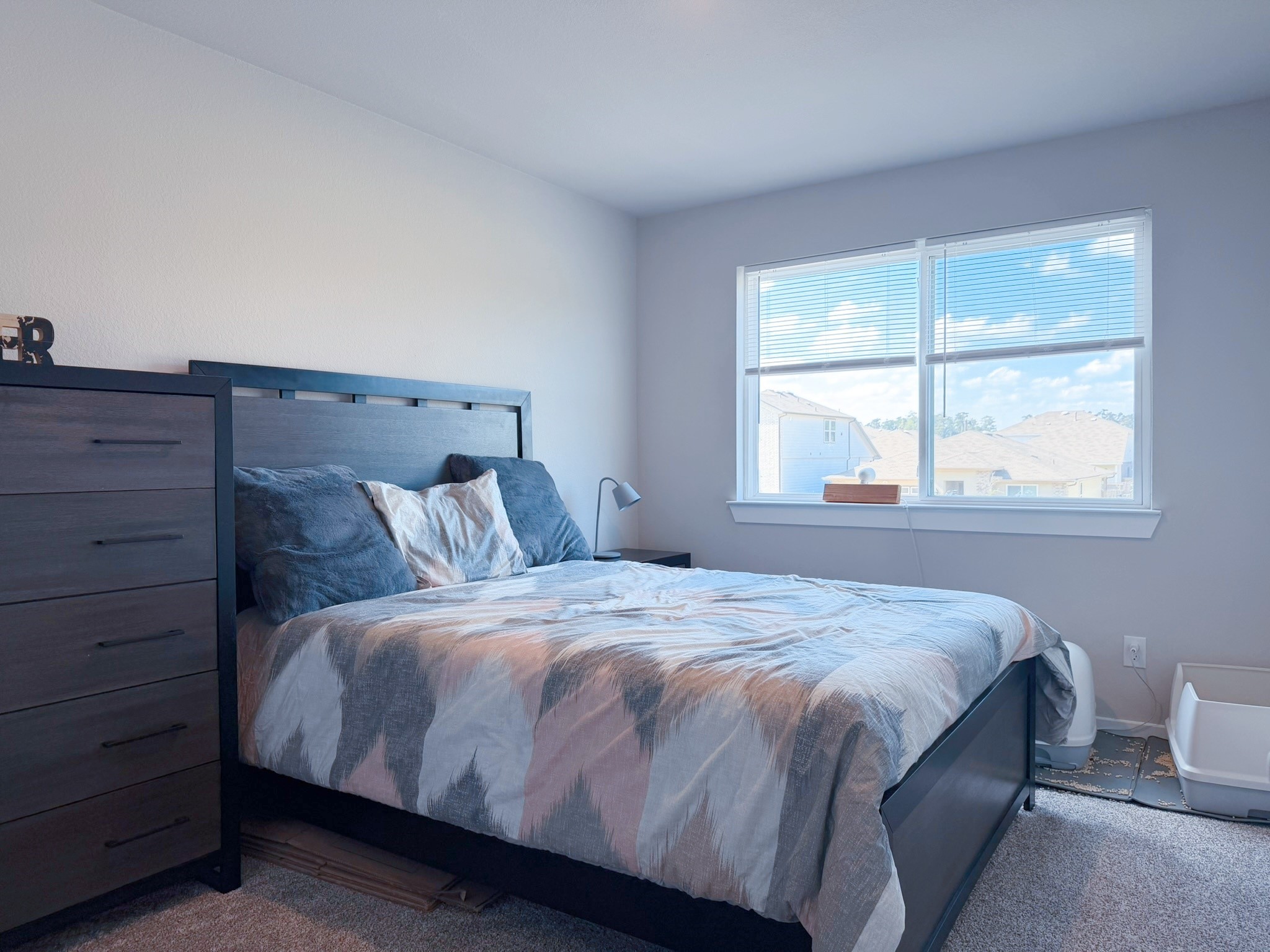 14003 Moose Creek Lane Conroe, TX 77384 - Photo 22 of 37 a bedroom with a bed and window