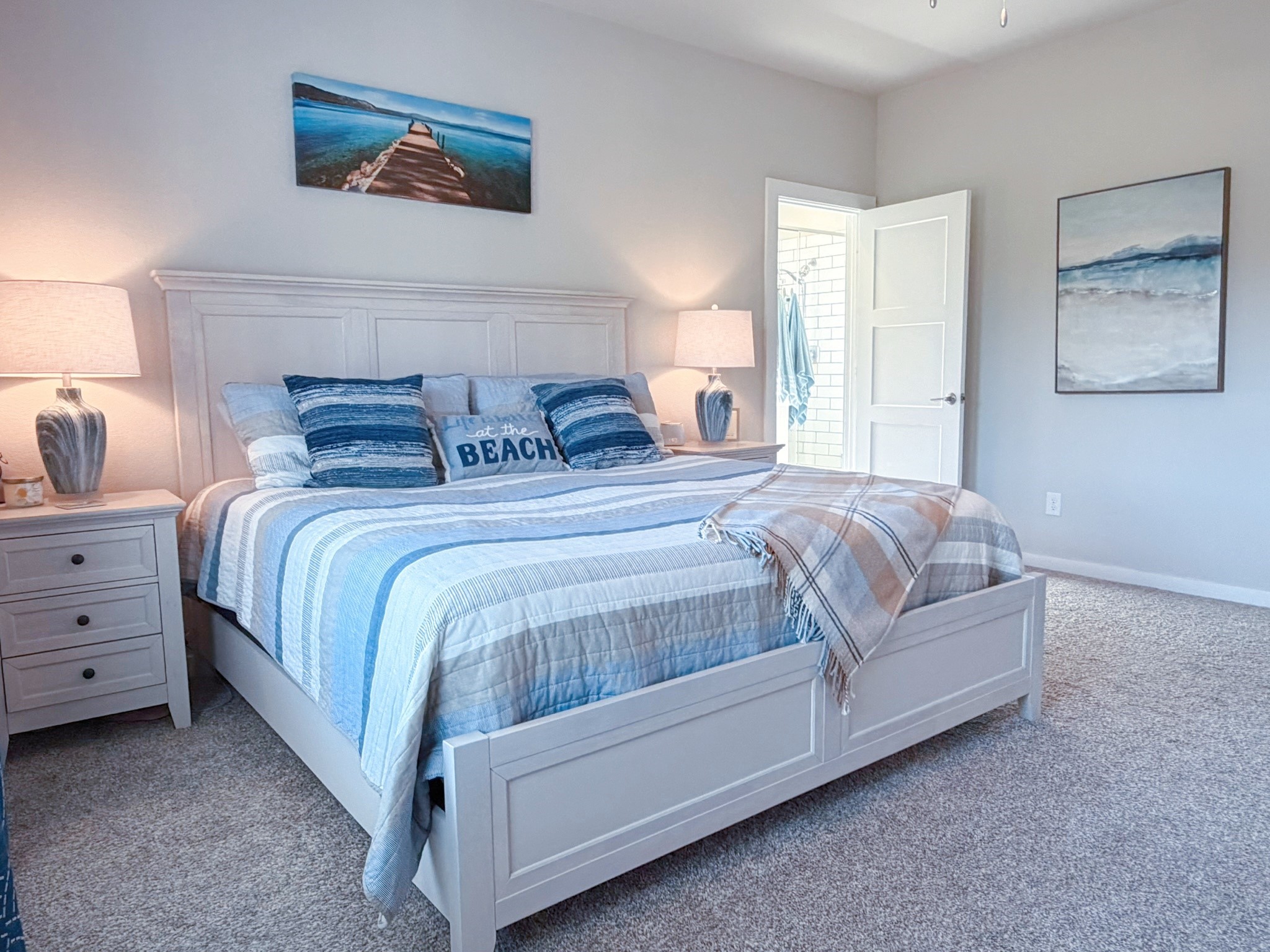 14003 Moose Creek Lane Conroe, TX 77384 - Photo 9 of 37 a bedroom with a bed and lamp