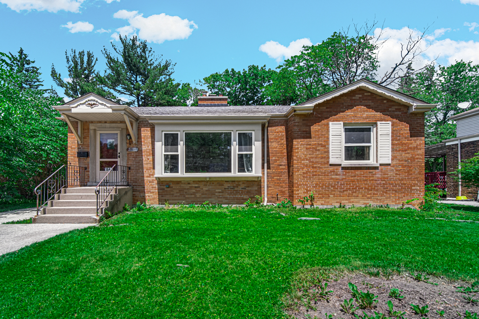 1644 West 187th Street Homewood, IL 60430 - Photo 1 of 24 a front view of house with yard and green space