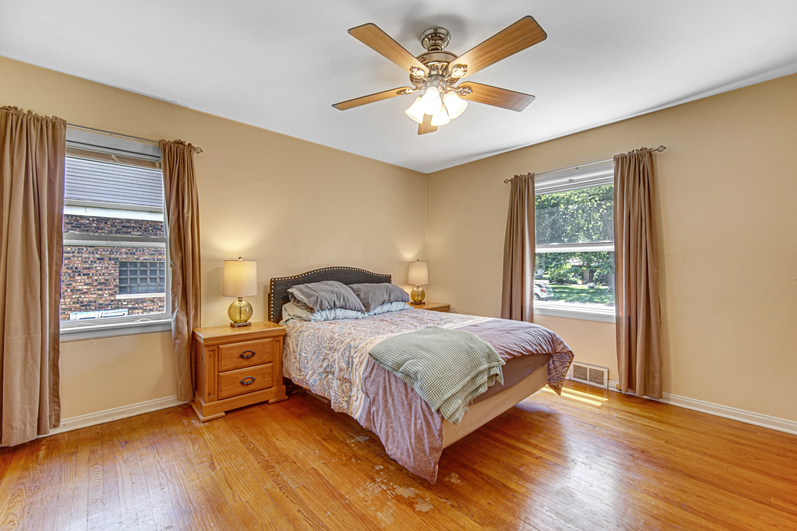 1644 West 187th Street Homewood, IL 60430 - Photo 14 of 24 a bedroom with a large bed and a window