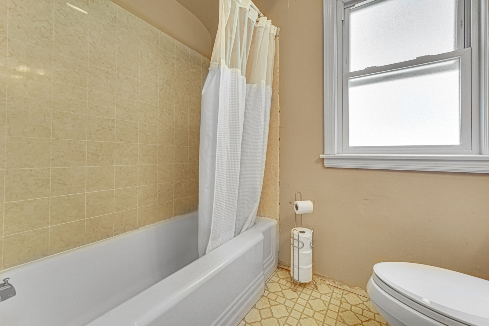1644 West 187th Street Homewood, IL 60430 - Photo 17 of 24 a bathroom with a granite countertop bathtub shower and toilet