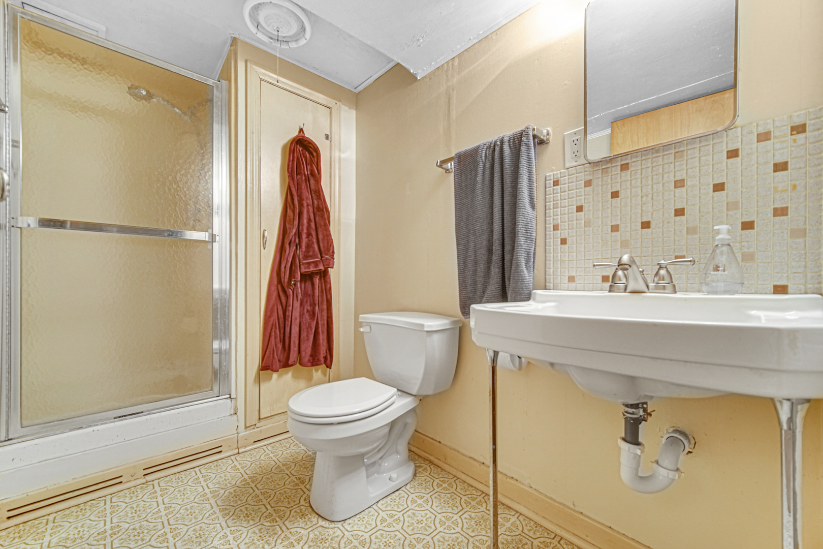 1644 West 187th Street Homewood, IL 60430 - Photo 18 of 24 a bathroom with a sink toilet and shower
