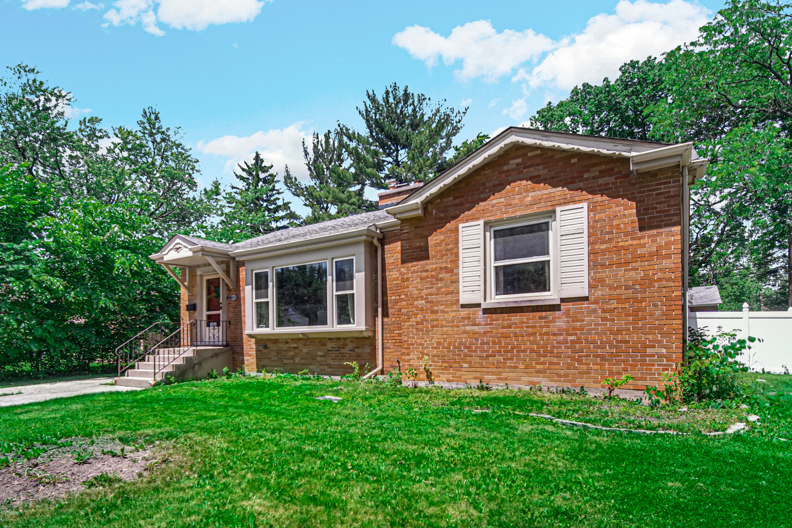1644 West 187th Street Homewood, IL 60430 - Photo 2 of 24 a front view of a house with a yard