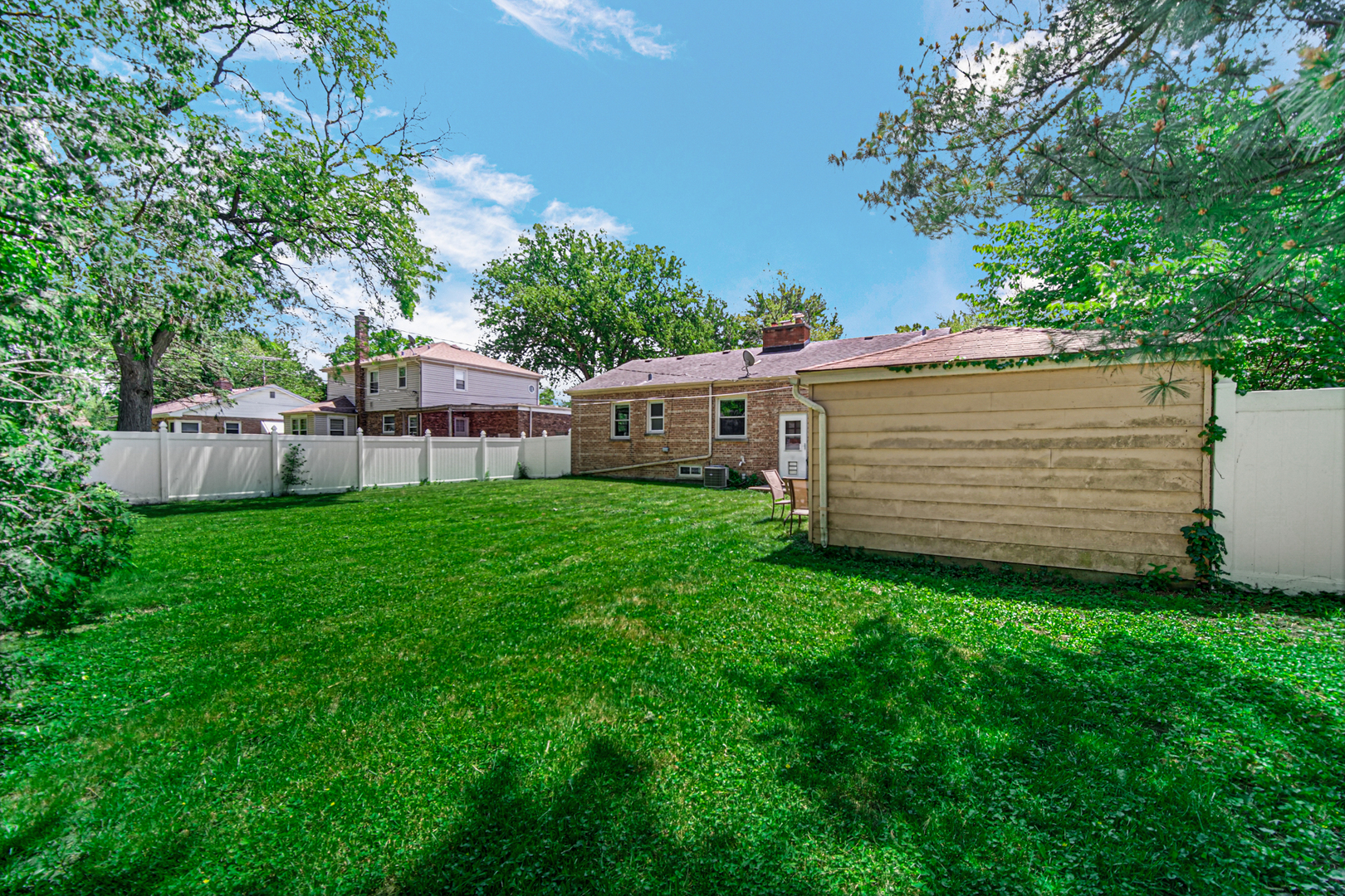 1644 West 187th Street Homewood, IL 60430 - Photo 24 of 24 a view of a house with backyard and sitting area