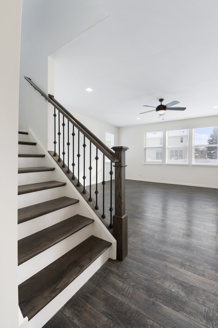 485 Stone Bluff Drive Romeoville, IL 60446 - Photo 17 of 35 a view of entryway and hall with wooden floor