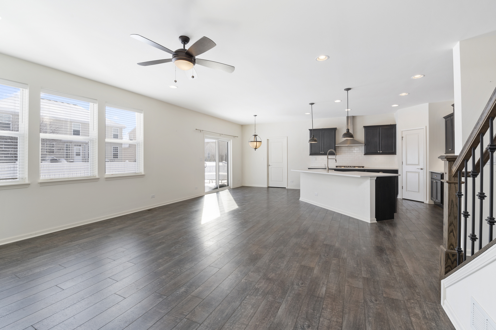 485 Stone Bluff Drive Romeoville, IL 60446 - Photo 18 of 35 a view of a kitchen with stove and wooden floor