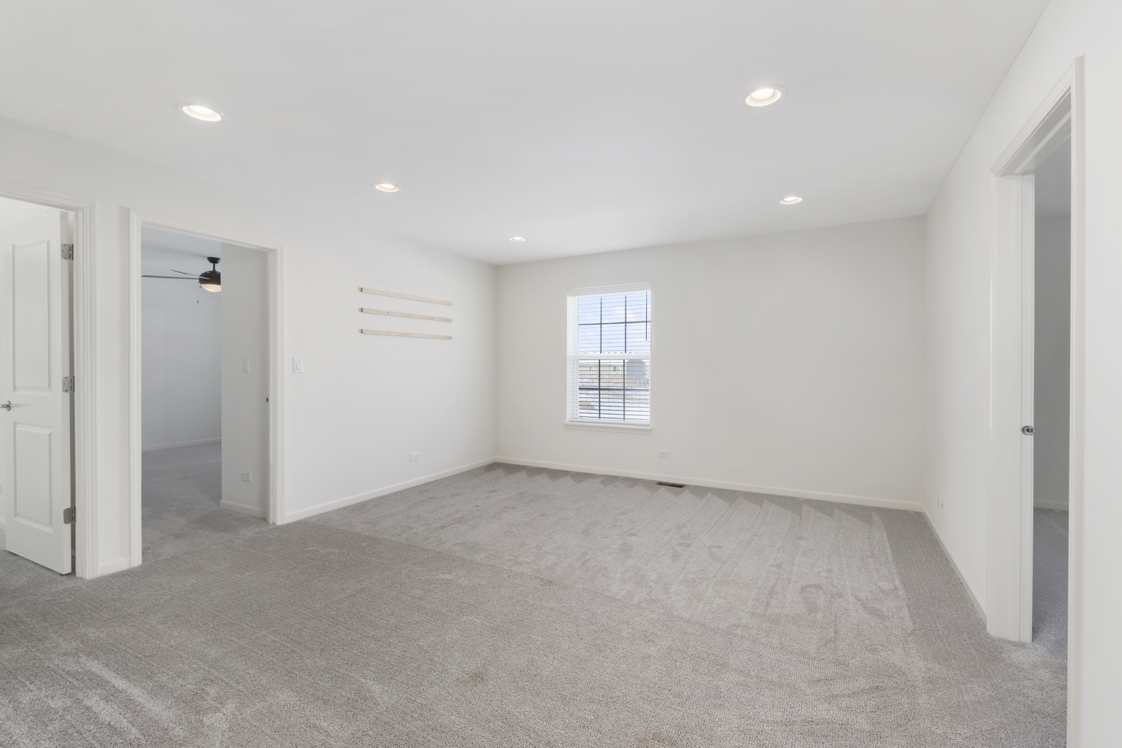 485 Stone Bluff Drive Romeoville, IL 60446 - Photo 24 of 35 an empty room with windows and closet