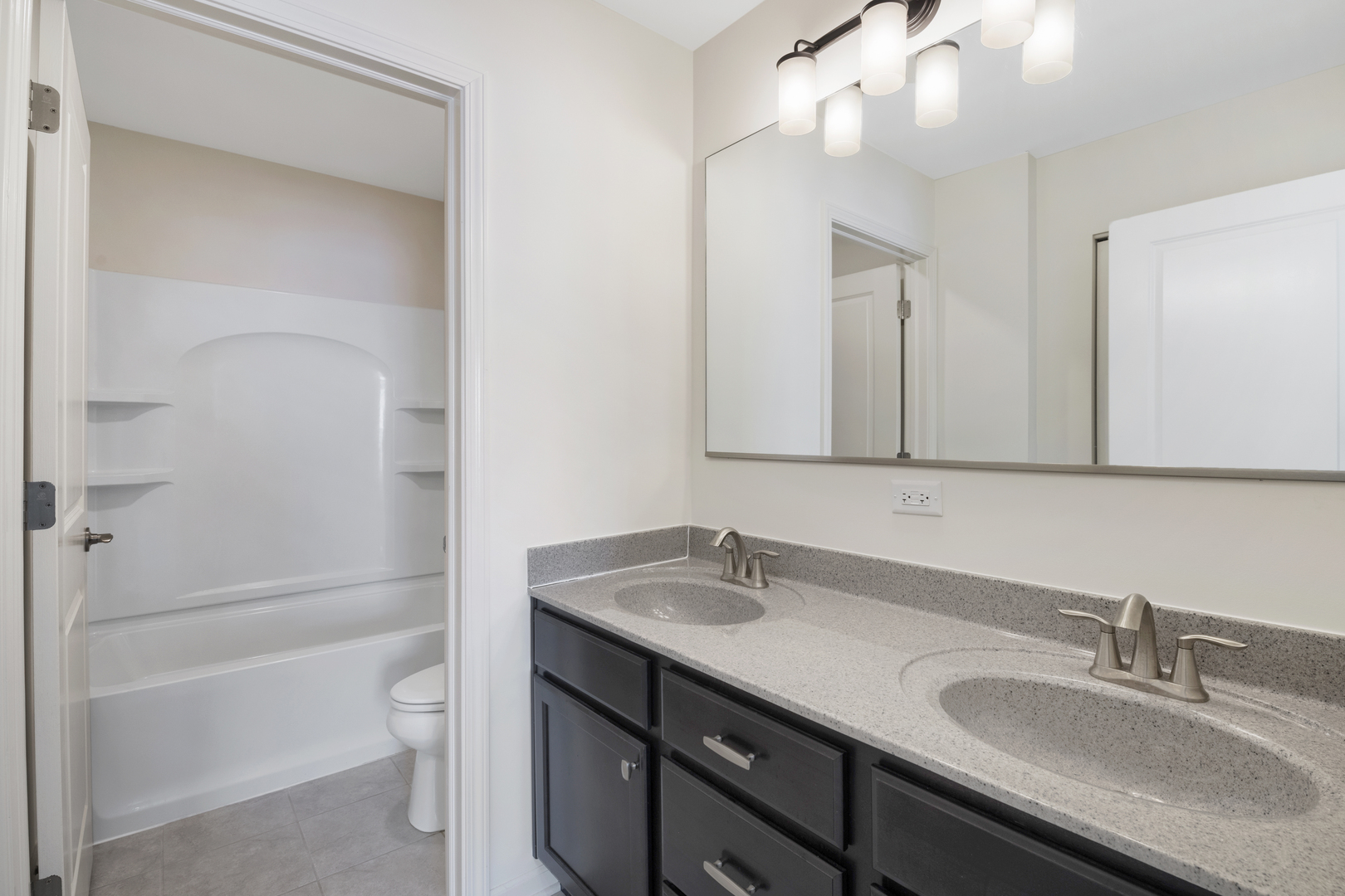 485 Stone Bluff Drive Romeoville, IL 60446 - Photo 26 of 35 a bathroom with a sink a toilet and shower