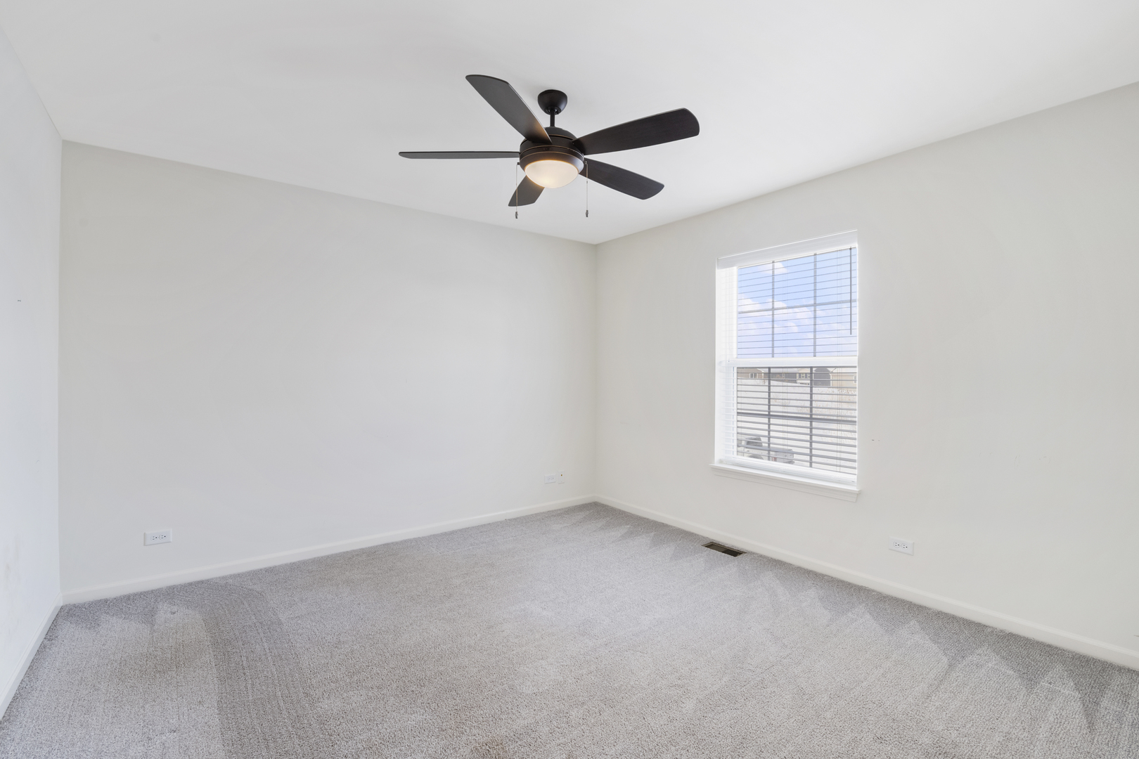 485 Stone Bluff Drive Romeoville, IL 60446 - Photo 28 of 35 an empty room with closet and windows