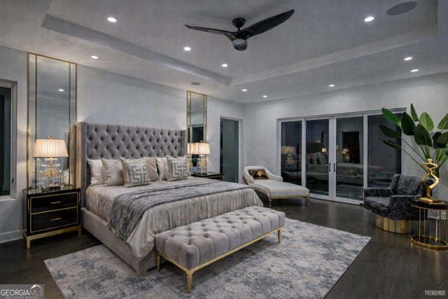 55 Serendipity Way Atlanta, GA 30350 - Photo 14 of 23 a bedroom with a bed and glass door