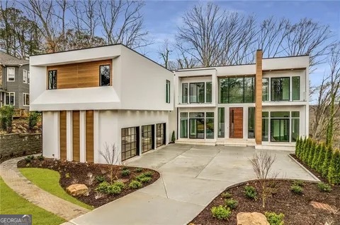 55 Serendipity Way Atlanta, GA 30350 - Photo 3 of 23 a front view of a house with a yard