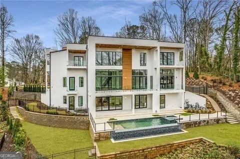 front view of a building with a swimming pool