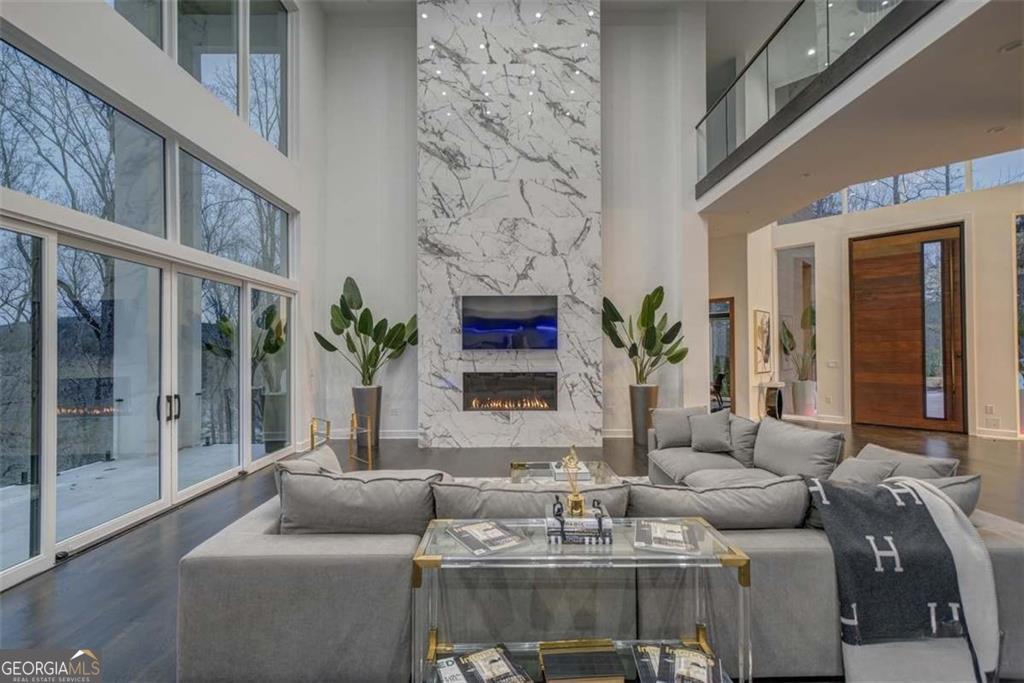 55 Serendipity Way Atlanta, GA 30350 - Photo 10 of 23 a living room with furniture and a fireplace