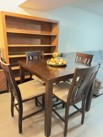 a workspace with table and chairs