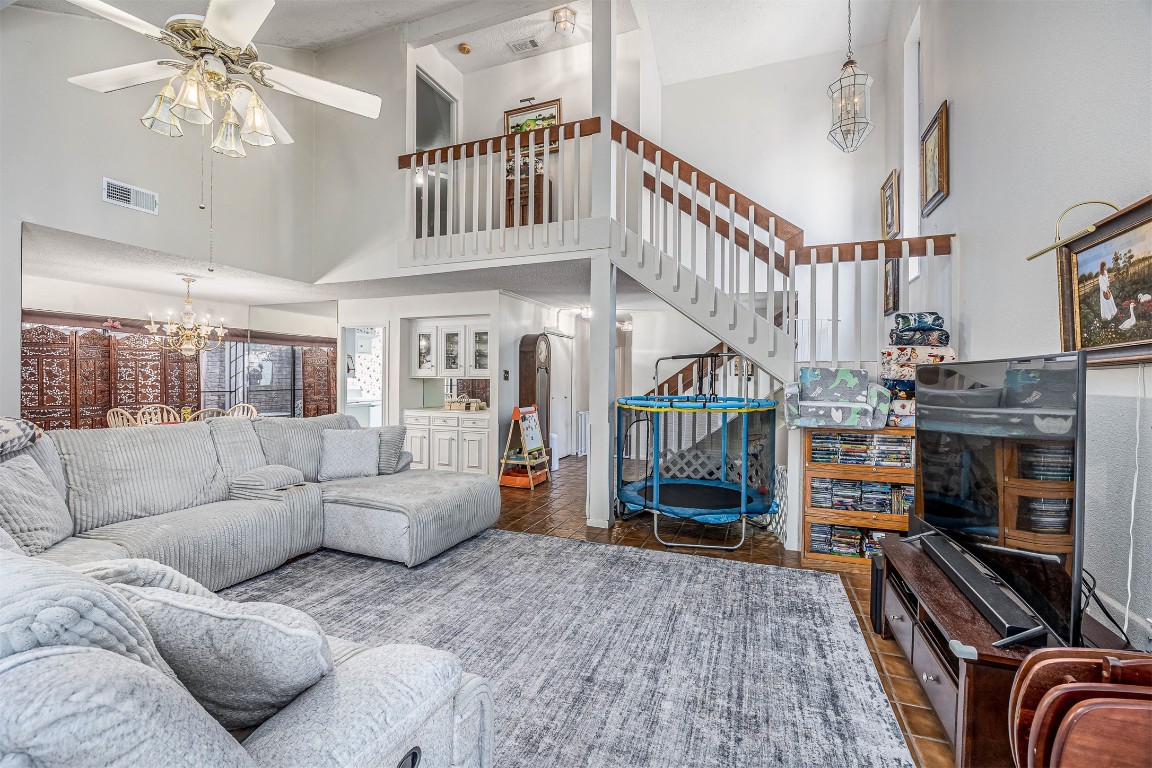4613 Country Club View Baytown, TX 77521 - Photo 11 of 38 a living room with furniture and a fireplace