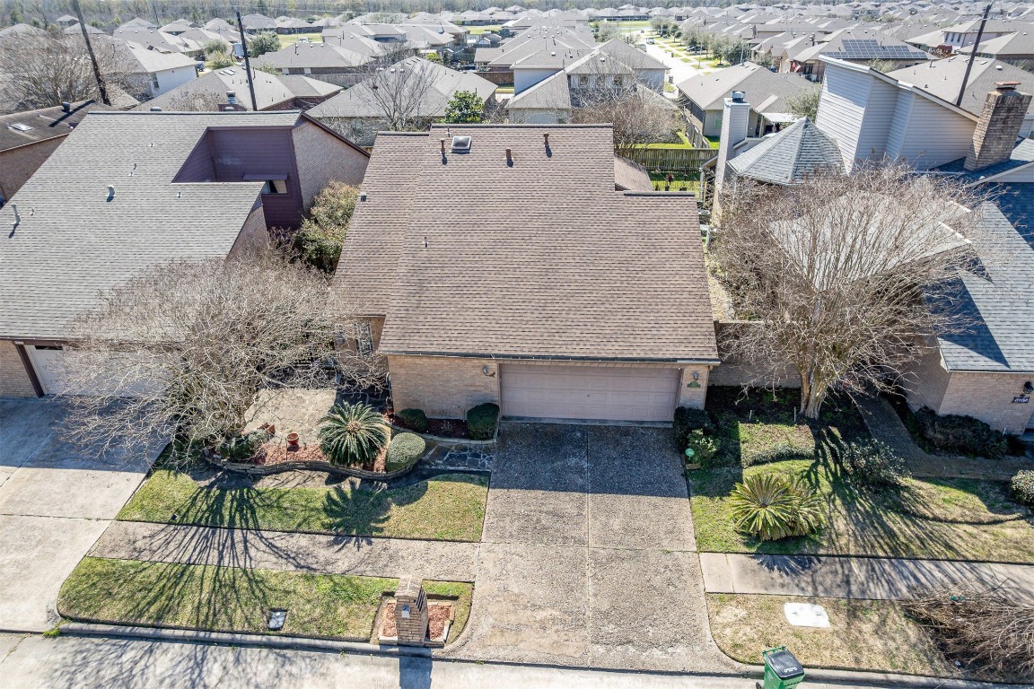 4613 Country Club View Baytown, TX 77521 - Photo 2 of 38 an aerial view of a house with a yard