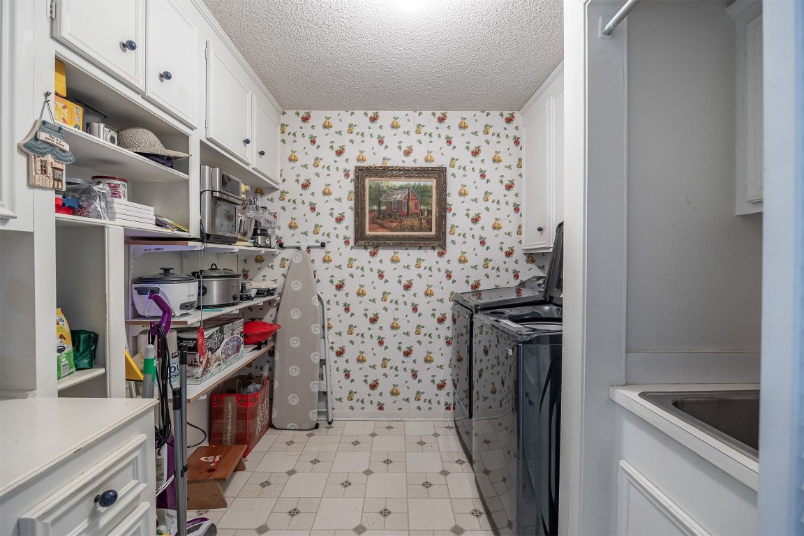 4613 Country Club View Baytown, TX 77521 - Photo 22 of 38 a room with storage and utility