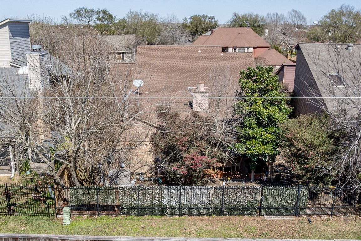 4613 Country Club View Baytown, TX 77521 - Photo 38 of 38 a view of a house with a yard and large trees