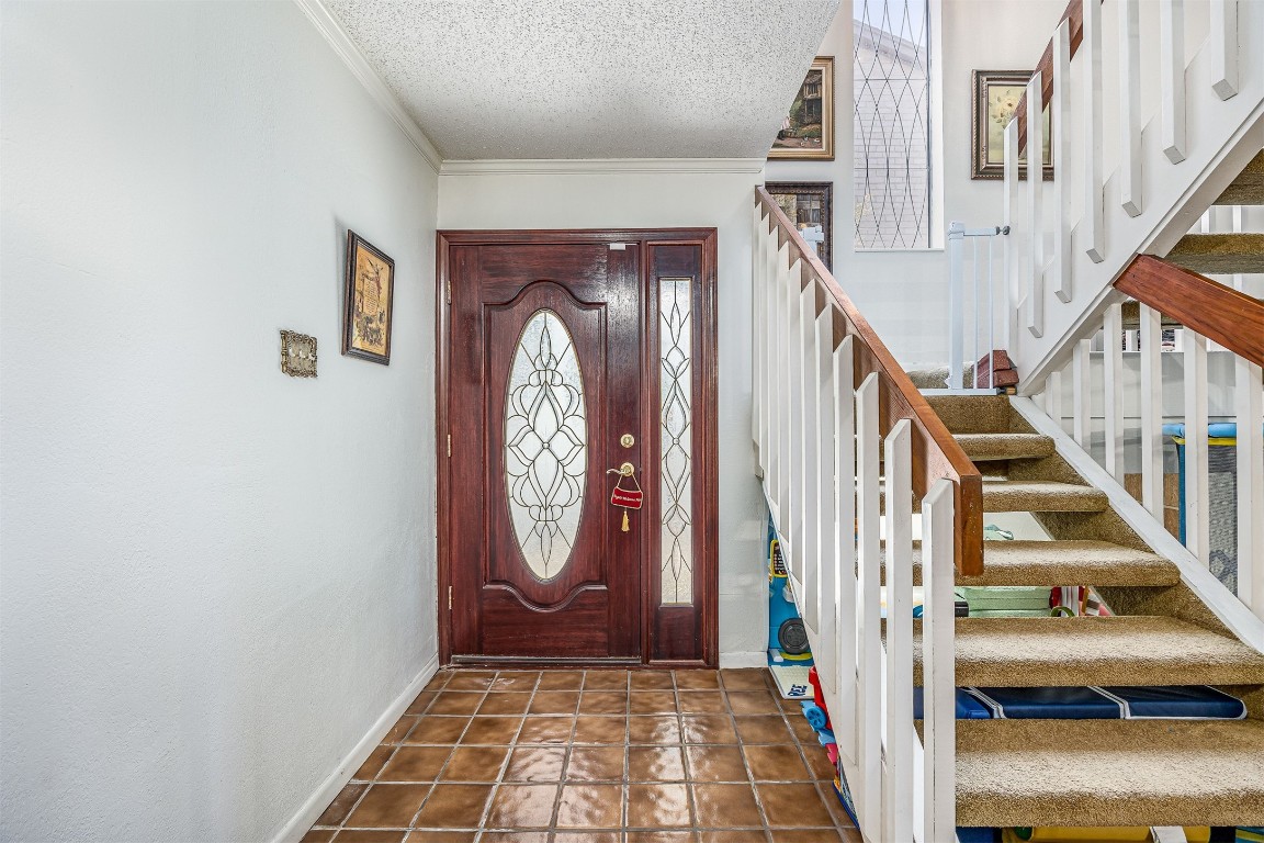 4613 Country Club View Baytown, TX 77521 - Photo 8 of 38 a view of a hallway with wooden floor and entryway
