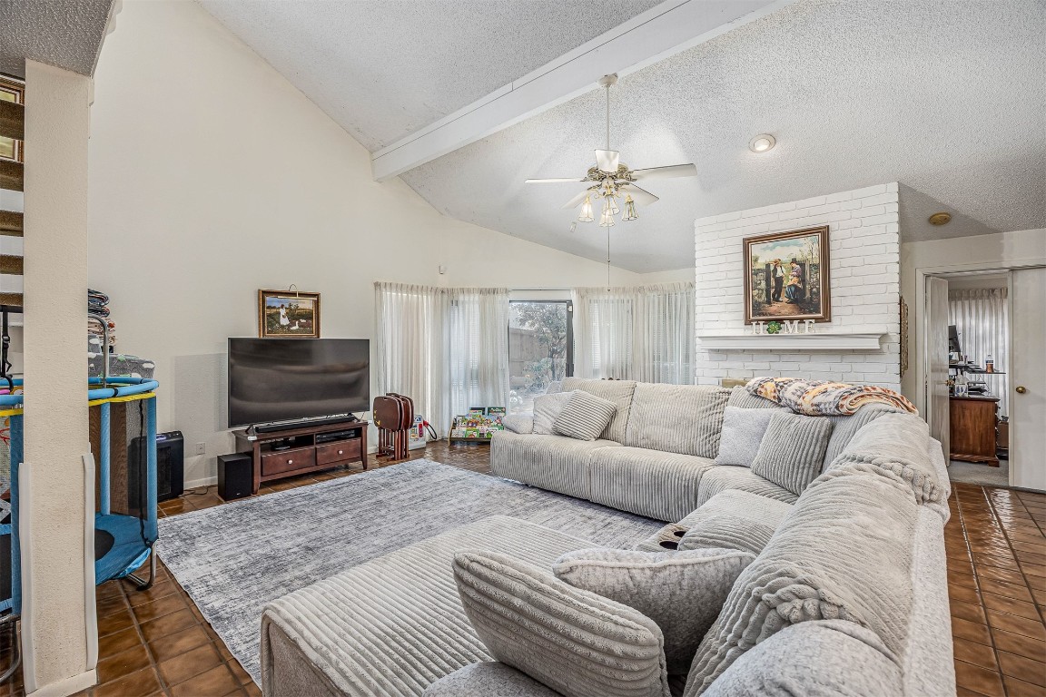 4613 Country Club View Baytown, TX 77521 - Photo 9 of 38 a living room with furniture and a flat screen tv