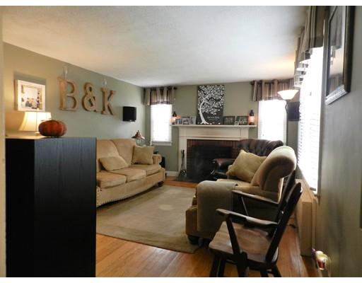 69 Gillette Circle Springfield, MA 01118 - Photo 3 of 26 a living room with furniture and a fireplace