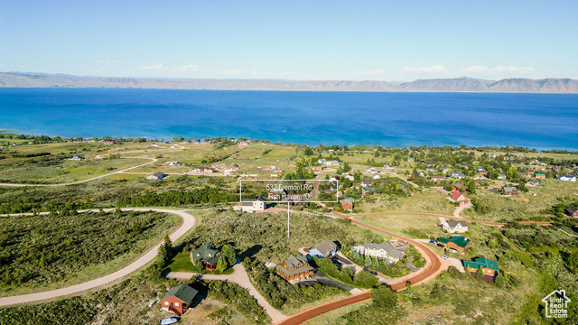 532 Fremont Road Fish Haven, ID 83287 - Photo 3 of 12 Aerial view of property and surrounding area featuring a water and mountain view