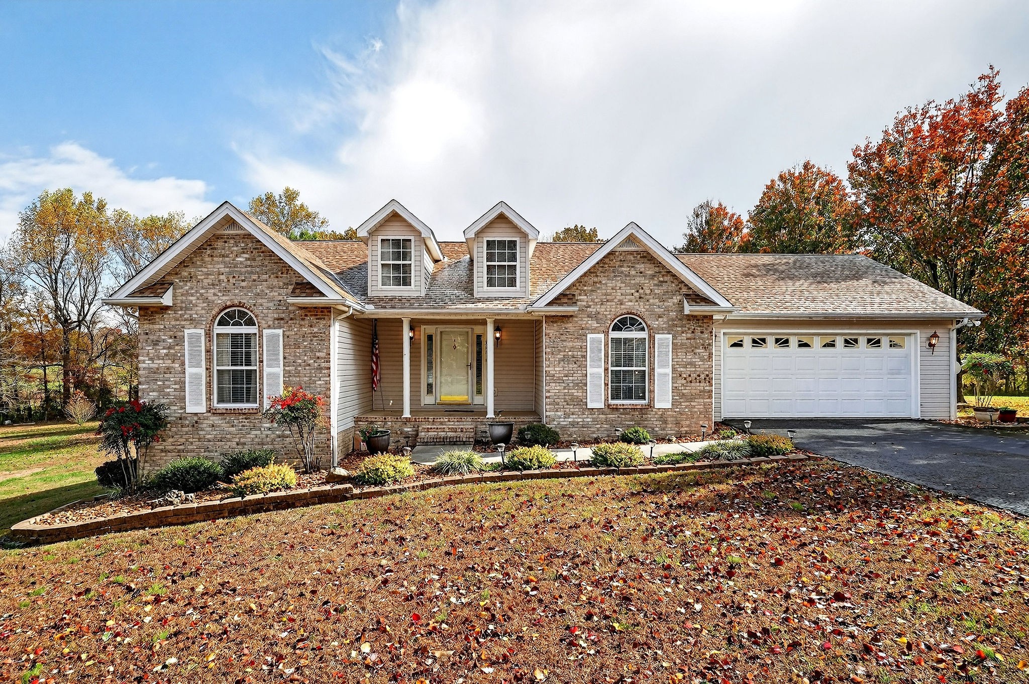 311 Poplar Point Lane Rickman, TN 38580 - Photo 1 of 36 a front view of a house with a yard