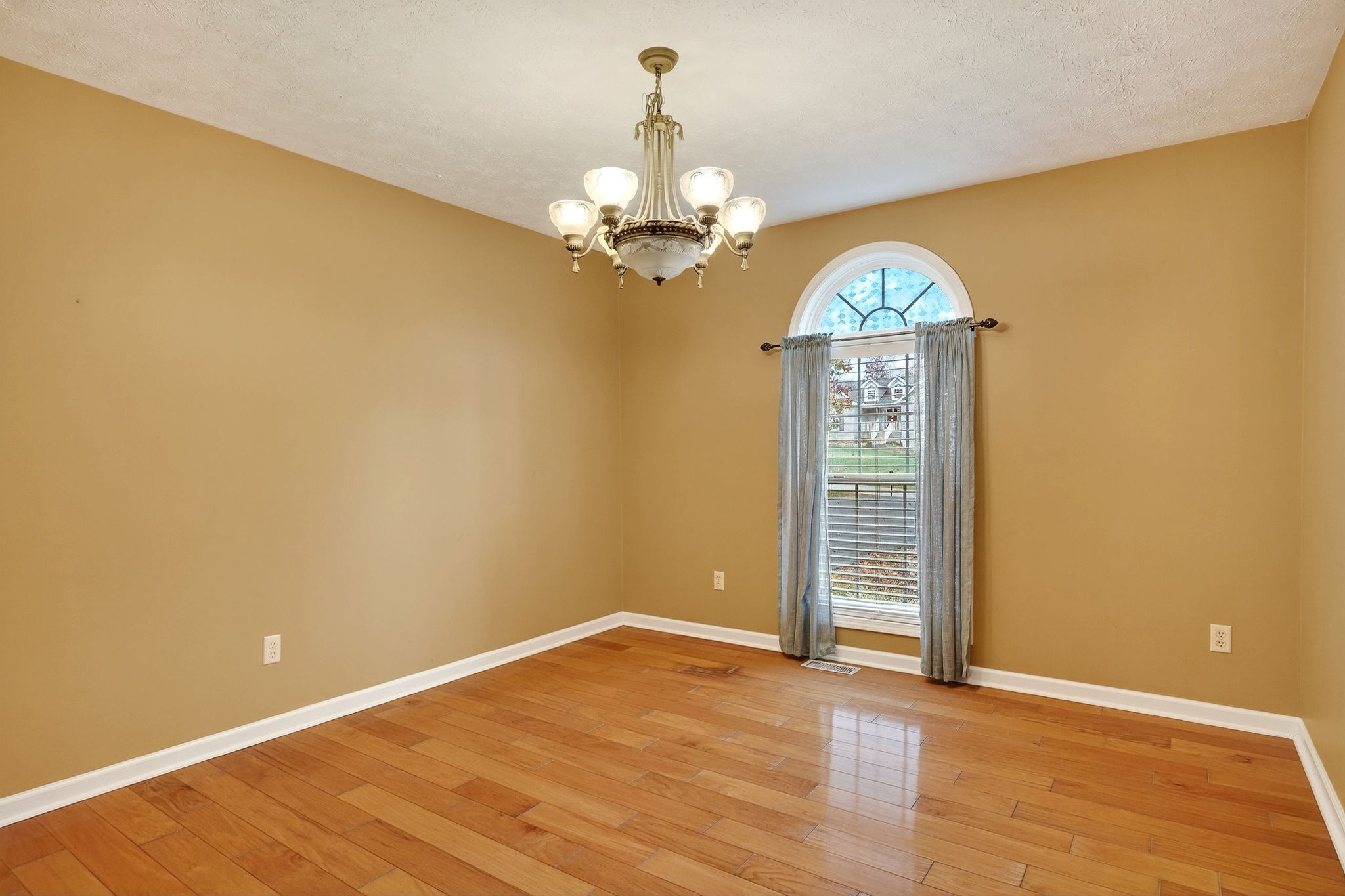 311 Poplar Point Lane Rickman, TN 38580 - Photo 11 of 36 a view of wooden floor and a chandelier in a room