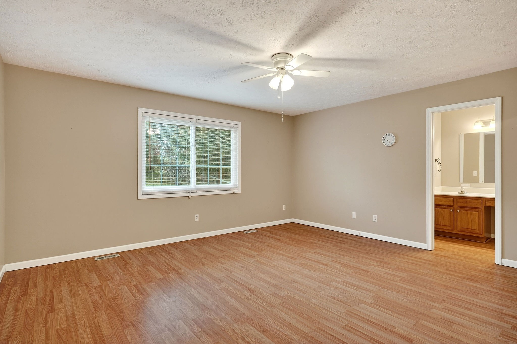 311 Poplar Point Lane Rickman, TN 38580 - Photo 14 of 36 a view of an empty room with wooden floor and a window