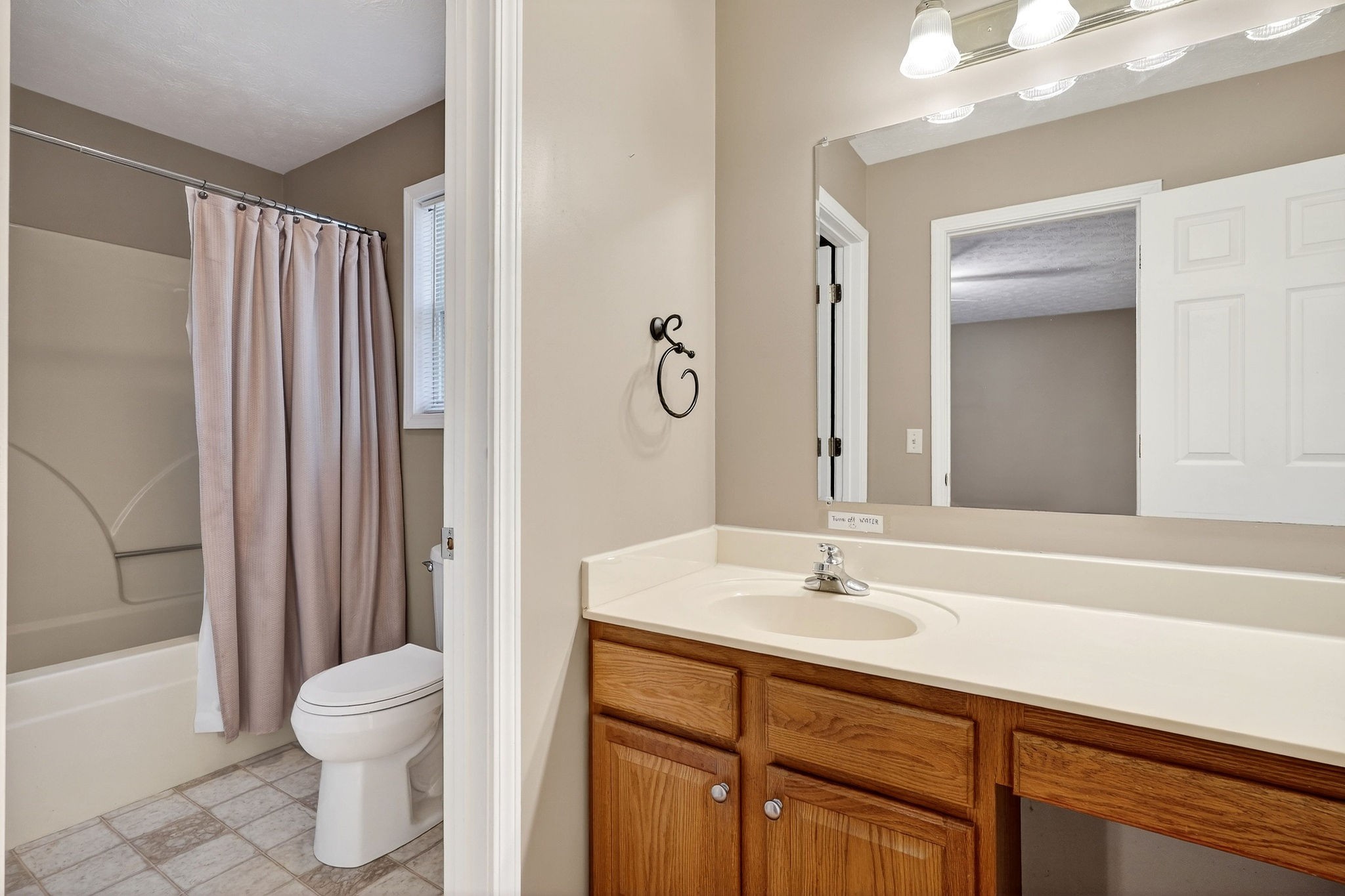 311 Poplar Point Lane Rickman, TN 38580 - Photo 18 of 36 a bathroom with a sink a toilet and shower